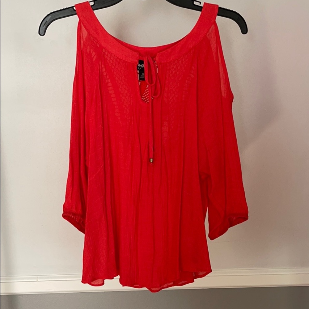 Coral “shoulder cut-out” Top